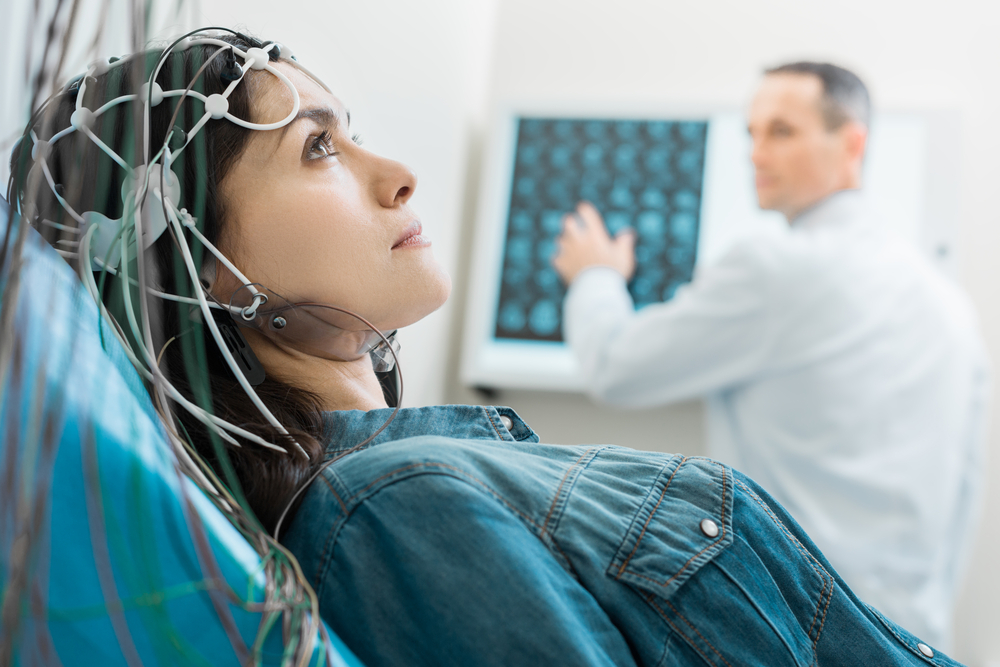 Patient receiving initial analysis with a qEEG.