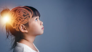 Child with brain superimposed